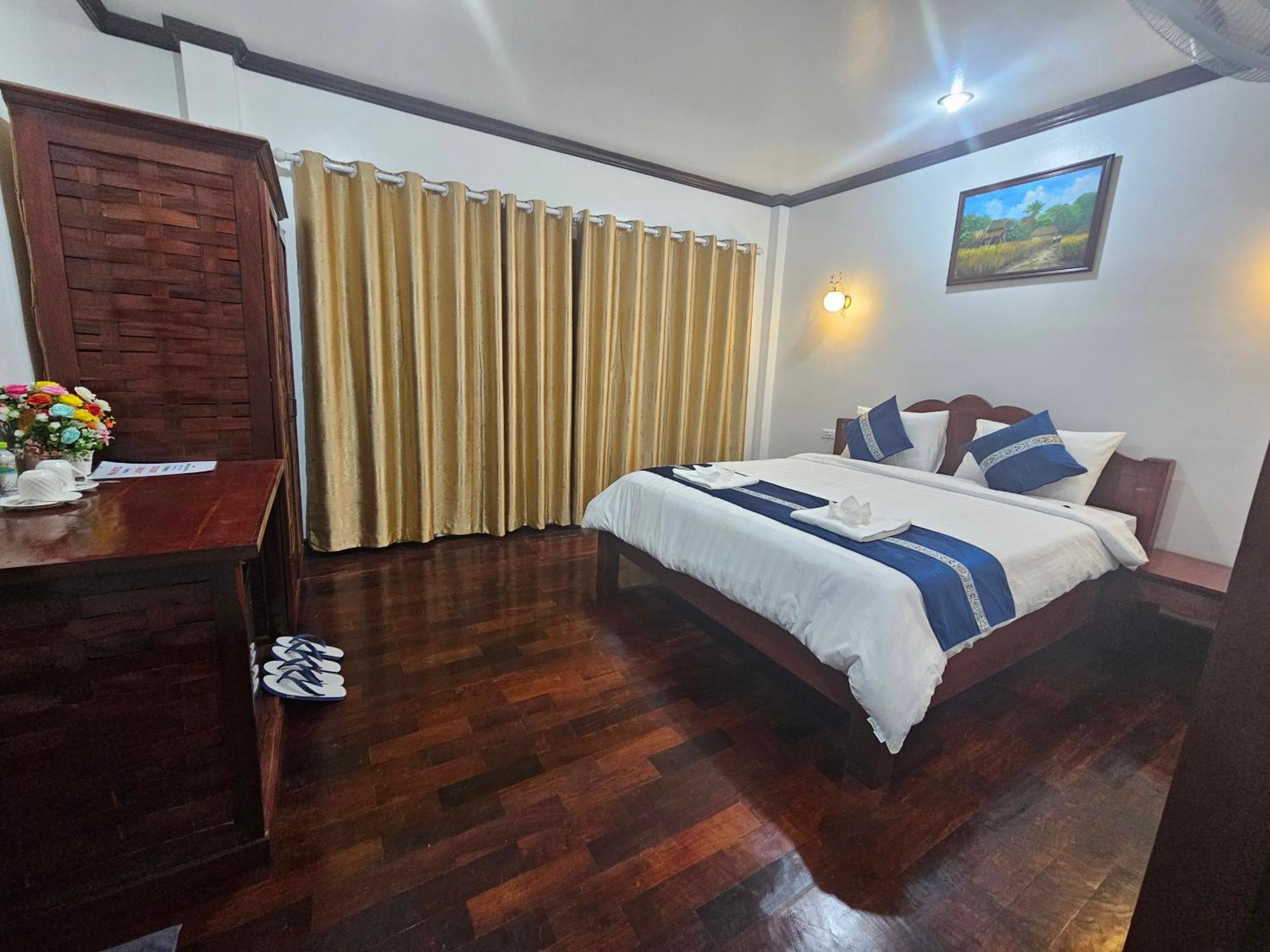 Win Hotel Vang Vieng Exterior photo