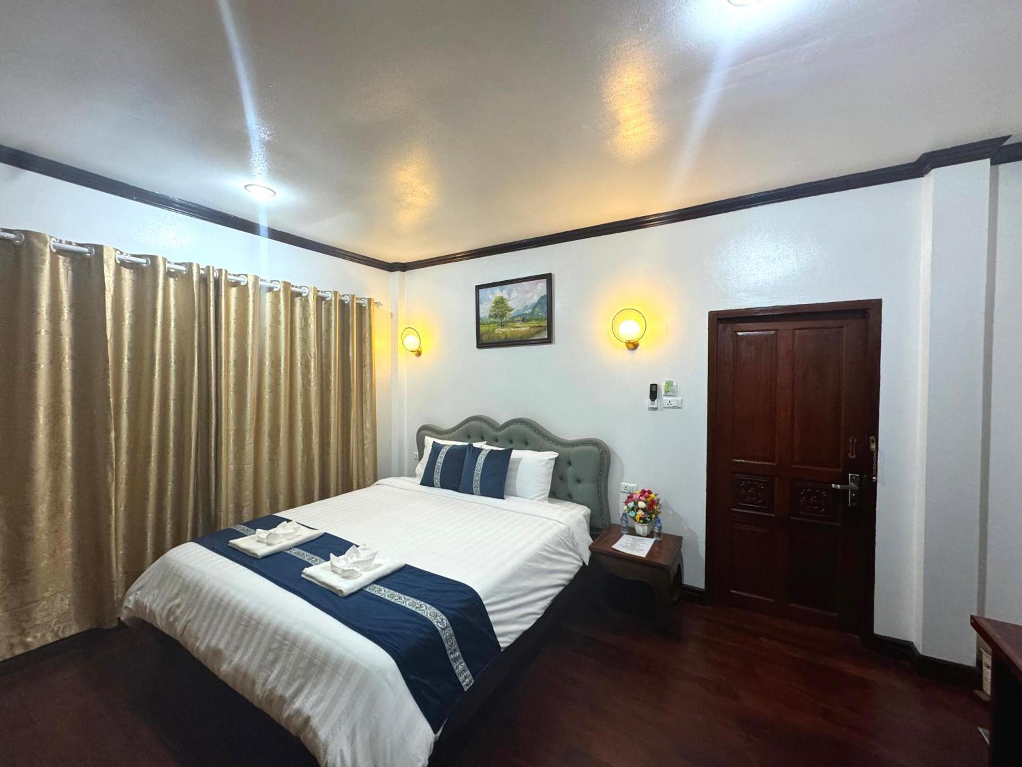 Win Hotel Vang Vieng Exterior photo