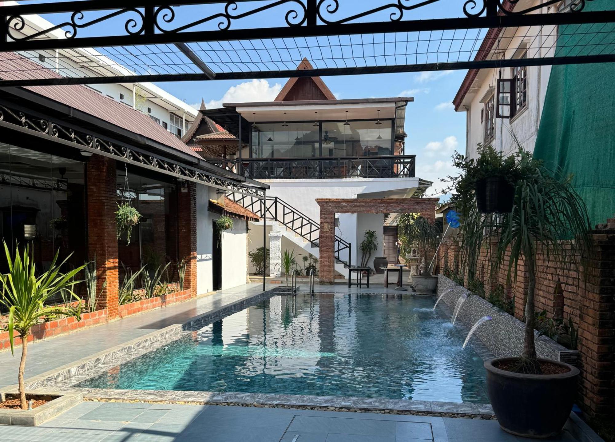 Win Hotel Vang Vieng Exterior photo